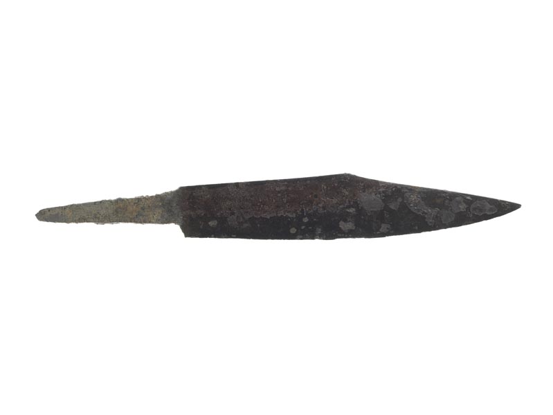 Iron scramasax, which looks like a knife blade. The handle is missing but the pointed iron tang from inside it remains.
