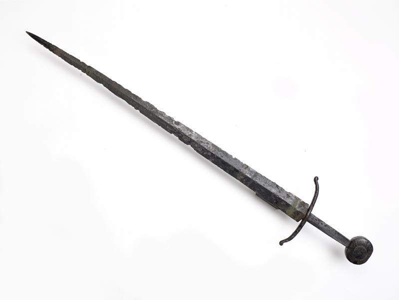 Iron sword with a round pommel on the end of the handle.