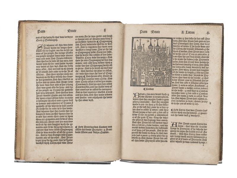 Open book, 'The Chronicle of England', showing a double-page spread. There are 2 columns of text on each page and a woodcut image of London showing the roofs of houses and church spires.