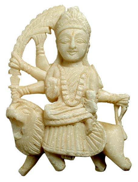 Goddess with several arms riding on a lion.