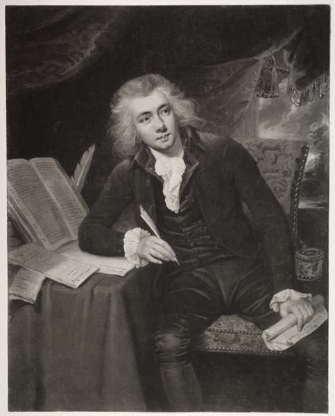 Young man seated at a table covered in writing materials, with a quill in one hand and a manuscript in the other.
